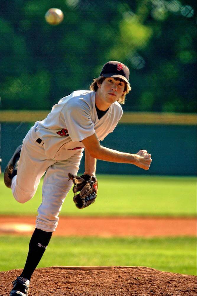 High School pitcher throws the ball